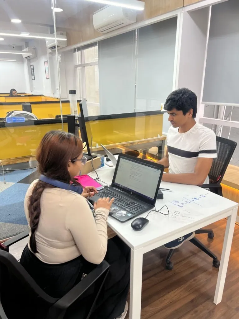 Team Discussing over Laptop